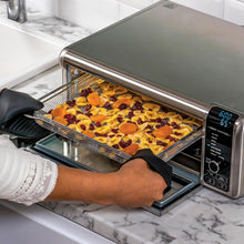 Load image into Gallery viewer, Ninja Foodi Four Multifonctions 8-en-1, Mini four portable, surfaces de travail, four multifonctions avec 8 fonctions de cuisson ; Air Fry, Rôtir, Griller, Cuire et plus encore. Argent/Noir SP101EU