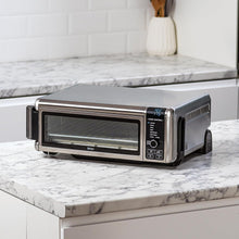 Load image into Gallery viewer, Ninja Foodi Four Multifonctions 8-en-1, Mini four portable, surfaces de travail, four multifonctions avec 8 fonctions de cuisson ; Air Fry, Rôtir, Griller, Cuire et plus encore. Argent/Noir SP101EU